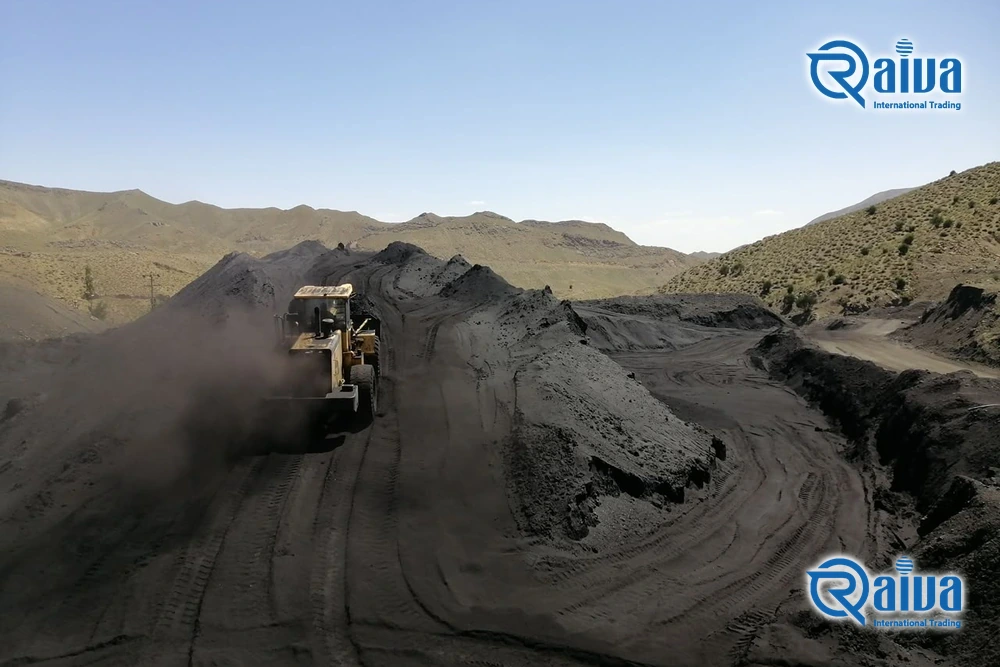 Wheel loader working a steam coal stockpile at the mine &mdash; thermal coal for power and cement &mdash; B2B bulk export supplier &mdash; Raivaco